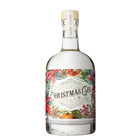 Christmas Gin 42 % vol mit Pflaume und winterlichen Gewürzen in klarer Flasche im Glas